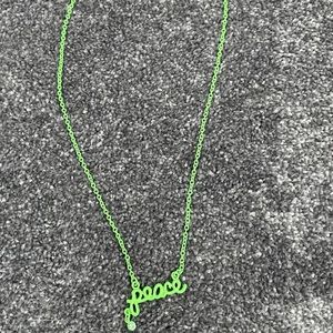 justice green “peace” necklace